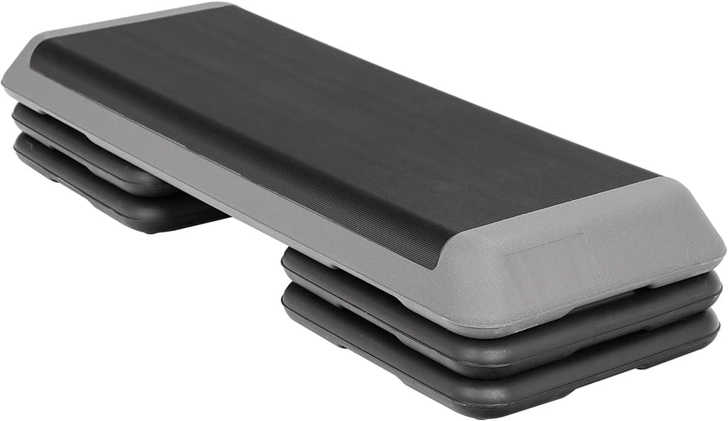 Black and gray step platform on a white background