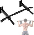 Black pull-up bar attached to a white wall with a person using it.